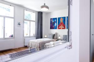 Posteľ alebo postele v izbe v ubytovaní Apartment MERAN