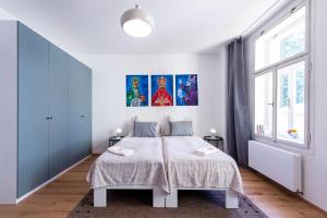 Posteľ alebo postele v izbe v ubytovaní Apartment MERAN
