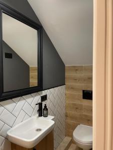 Koupelna v ubytování Top Ferienwohnung ALBERGO in Altenau + 20 fotografií