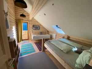 Ein Bett oder Betten in einem Zimmer der Unterkunft Alpenchalet Grabner Alm am Präbichl