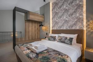 Postel nebo postele na pokoji v ubytování Mare Blue Suites