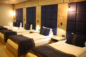 A bed or beds in a room at Grand Catalkaya Hotel