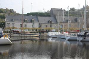 a group of boats are docked in a harbor at Maison Bretagne proche Penestin port La Roche Bernard 5 à 6 pers in La Roche-Bernard