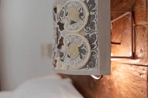 A bed or beds in a room at Villa Lice - Coronata