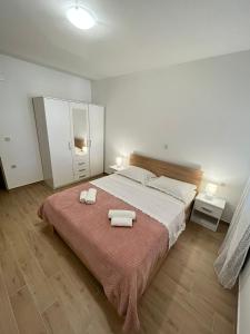 Posteľ alebo postele v izbe v ubytovaní Apartman Maša