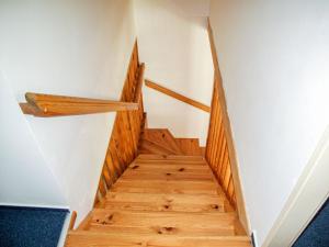 a staircase in a house with wooden floors at Holiday Home Holiday Hill 54 by Interhome in Cerny Dul +33 photos