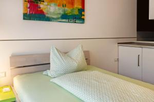 Łóżko lub łóżka w pokoju w obiekcie Apartment 3