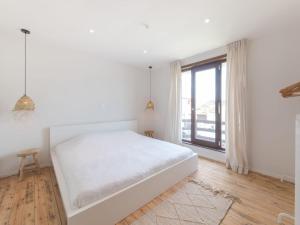 Ένα ή περισσότερα κρεβάτια σε δωμάτιο στο Villa Hutje bij de Zee by Interhome