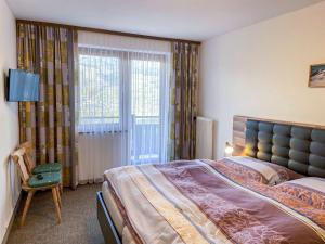 Postel nebo postele na pokoji v ubytování Apartment Ferwienwohnung Oberberghof by Interhome
