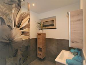 Koupelna v ubytování Apartment Haus Sonja by Interhome