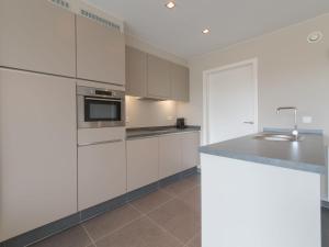 Kuchyň nebo kuchyňský kout v ubytování Apartment Solis by Interhome