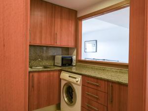 Kuchyň nebo kuchyňský kout v ubytování Apartment Puig Rom by Interhome + 18 fotografií