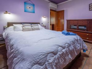 Postel nebo postele na pokoji v ubytování Holiday Home Romulia by Interhome