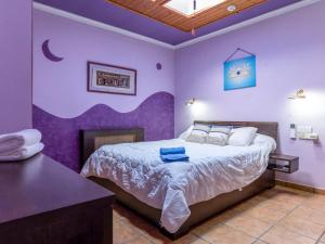 Postel nebo postele na pokoji v ubytování Holiday Home Romulia by Interhome