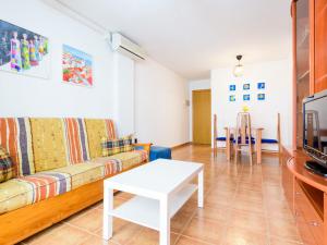TV a/nebo společenská místnost v ubytování Apartment Entreplayas - Morro de Gos by Interhome