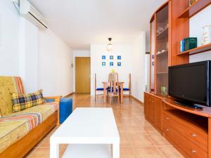 TV a/nebo společenská místnost v ubytování Apartment Entreplayas - Morro de Gos by Interhome + 19 fotografií