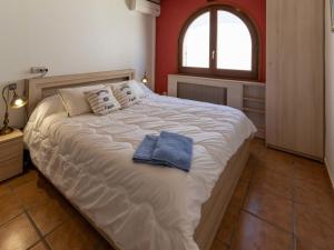 Postel nebo postele na pokoji v ubytování Holiday Home Romulia by Interhome