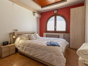 Postel nebo postele na pokoji v ubytování Holiday Home Romulia by Interhome