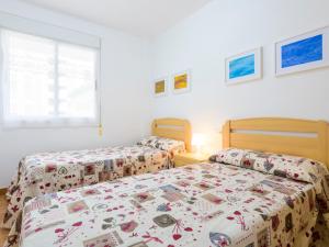 Postel nebo postele na pokoji v ubytování Apartment Entreplayas - Morro de Gos by Interhome