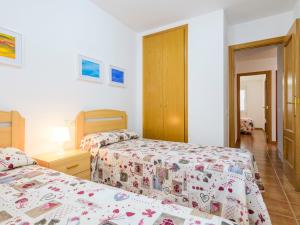 Postel nebo postele na pokoji v ubytování Apartment Entreplayas - Morro de Gos by Interhome
