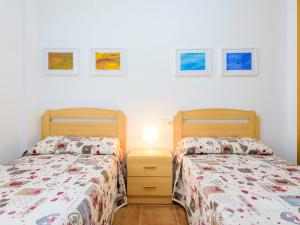 Postel nebo postele na pokoji v ubytování Apartment Entreplayas - Morro de Gos by Interhome