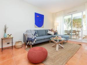 A seating area at Apartment Green Mar H by Interhome
