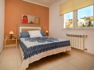 Posteľ alebo postele v izbe v ubytovaní Holiday Home Fleur by Interhome