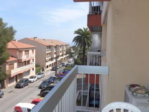 a balcony with a view of a city street at Apartment L'Espelido-5 by Interhome in Saint-Aygulf