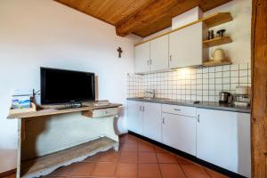 Kuchyňa alebo kuchynka v ubytovaní Mayrhof Apartment Tanne
