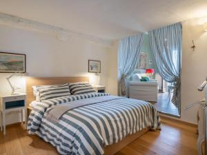 Posteľ alebo postele v izbe v ubytovaní Apartment Al Monastero by Interhome