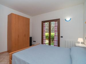 Postel nebo postele na pokoji v ubytování Apartment Wave by Interhome