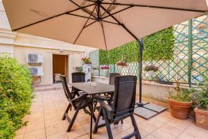 Patio nebo venkovní prostory v ubytování JMartins Roma Suites