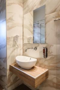 Kúpeľňa v ubytovaní Studios Drakontis + 37 fotografií
