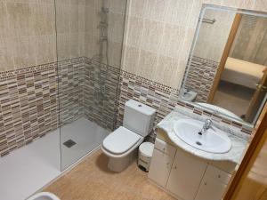 A bathroom at Miguel Hernandez, centro, 3 dormitorios, by Bookindenia