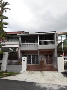 a white house with a gate in front of it at Simple Home Taiping 简居 Lakeview in Taiping