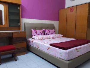 Postel nebo postele na pokoji v ubytování Simple Home Taiping 简居 Lakeview