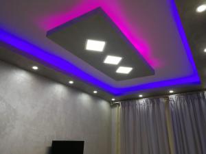 a ceiling with purple lights in a room at شاليهات بورتو مطروح فيو بحر Porto Matrouh Sea View Families Only in Marsa Matruh
