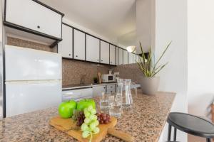 A kitchen or kitchenette at Apartamentos Riviera Arysal