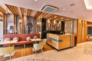Posezení v ubytování Carine Hotel Centar