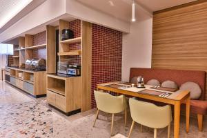 Kuchyň nebo kuchyňský kout v ubytování Carine Hotel Centar