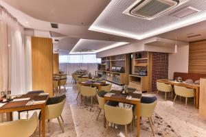 Posezení v ubytování Carine Hotel Centar