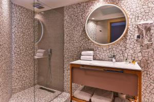 Koupelna v ubytování Carine Hotel Centar