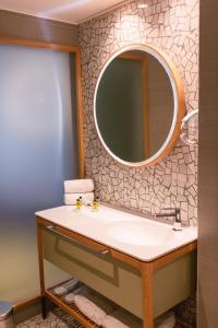 Koupelna v ubytování Carine Hotel Centar