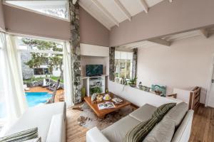 TV a/nebo společenská místnost v ubytování Runa Moraira Apart & Spa