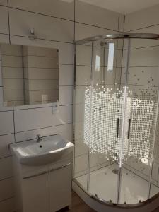A bathroom at Zakątek Mikołajewo 14