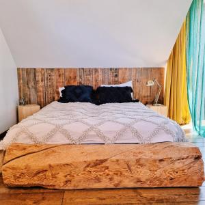 מיטה או מיטות בחדר ב-Lilia