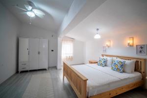 Cama ou camas em um quarto em Datça Gül Apart