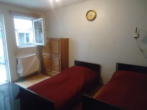 Postel nebo postele na pokoji v ubytování Guest House R&T