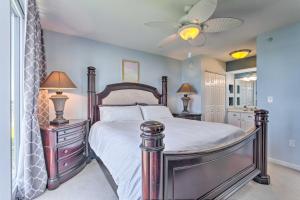 a bedroom with a bed and a ceiling fan at The Terrace at Pelican Beach Resort: View + Pool! in Destin +36 photos