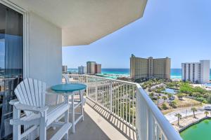 a balcony with a table and a view of the ocean at The Terrace at Pelican Beach Resort: View + Pool! in Destin